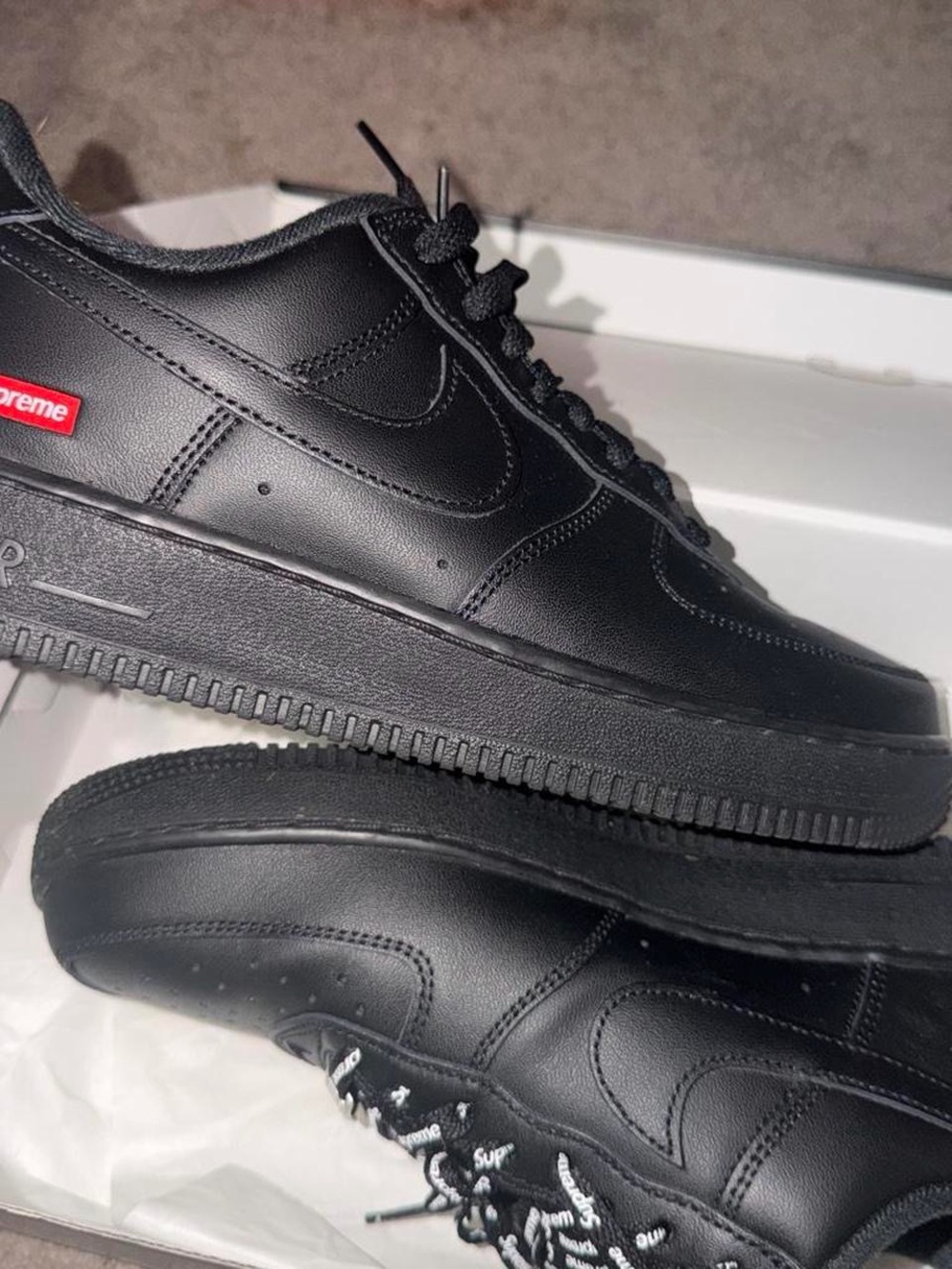 Nike Men’s Black Leather Low-Top Sneakers with Red Accent